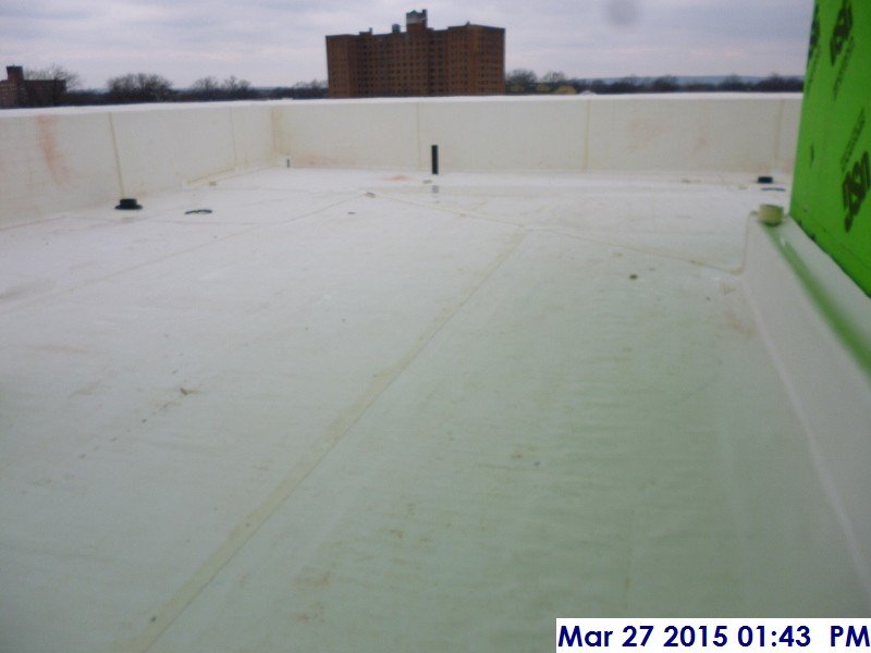 Installed roofing membrane at the lower roof Facing North